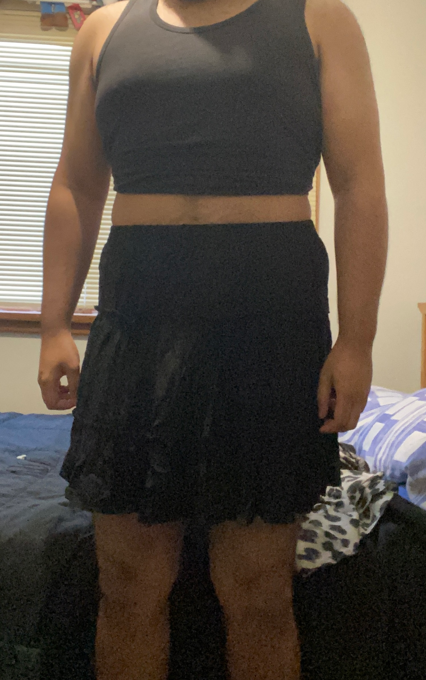 Wearing feminine clothing